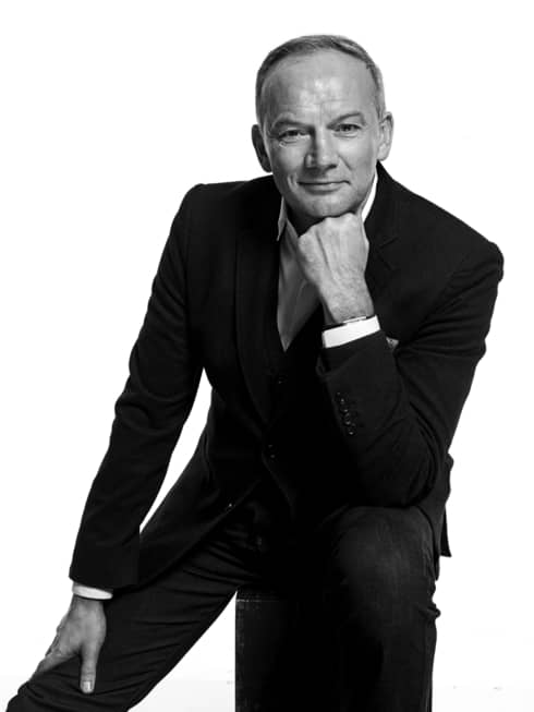 Black-and-white portrait photo of Executive Chef Christian Le Squer