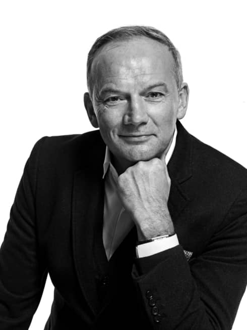 Black-and-white portrait photo of Executive Chef Christian Le Squer