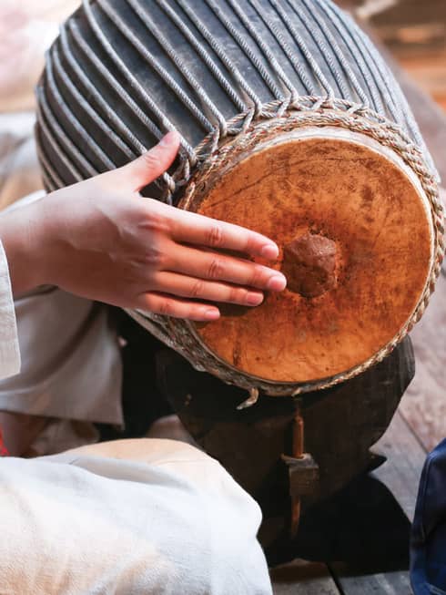 Local plays traditional Thai drum