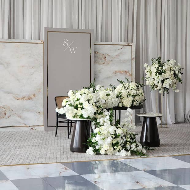 A beautiful floral arrangement with varying light shades of gray.