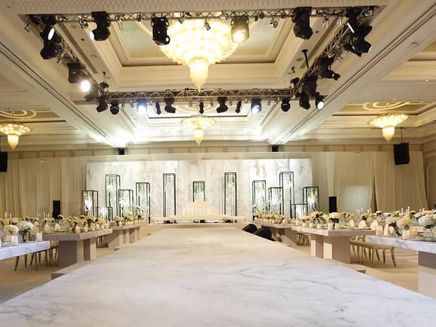 Event space decorated for wedding in luxury hotel in Doha - photo by @myeventsq