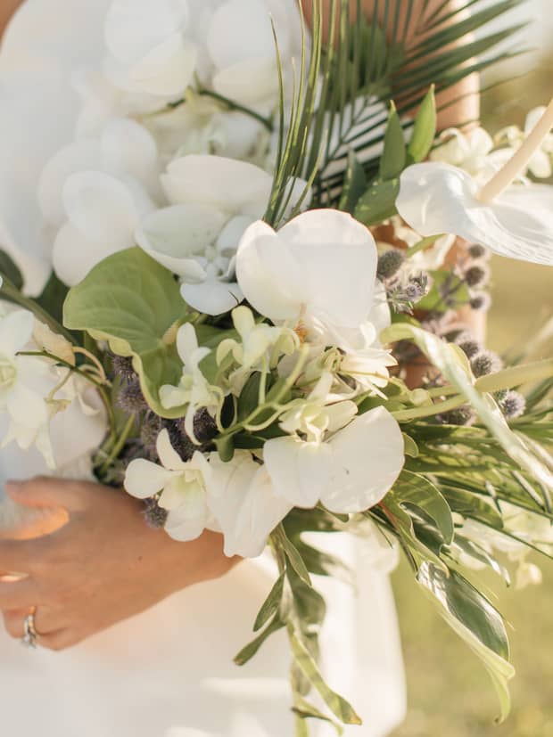 Close up of a bride holding a floral bouquet