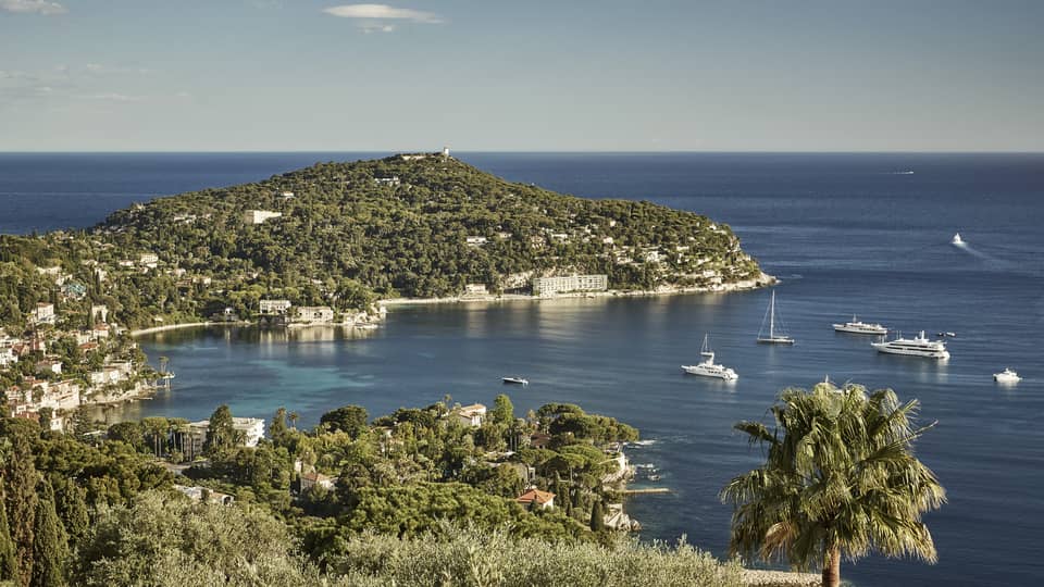 A variety of boats exploring a harbor in Cote d'Azur