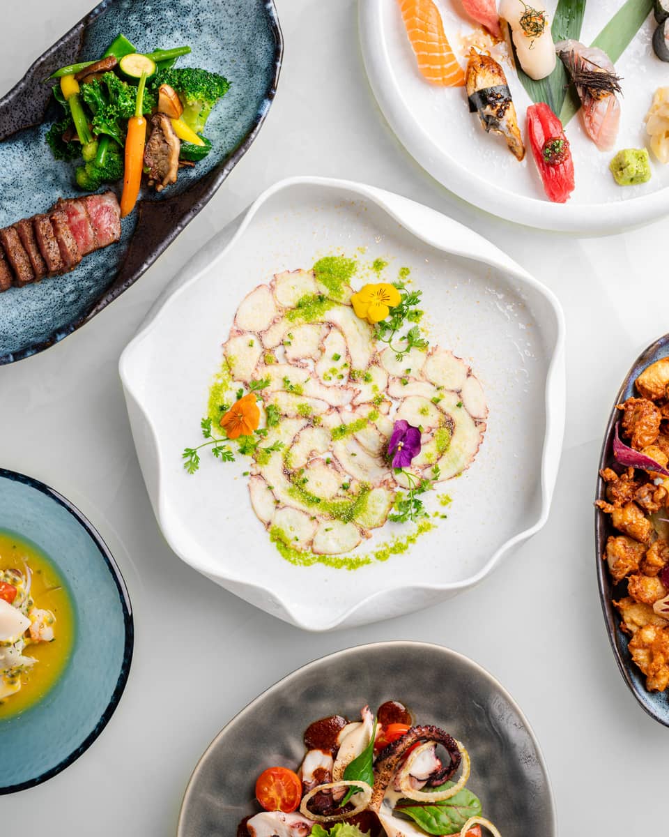 Colouful small-plate and sushi dishes