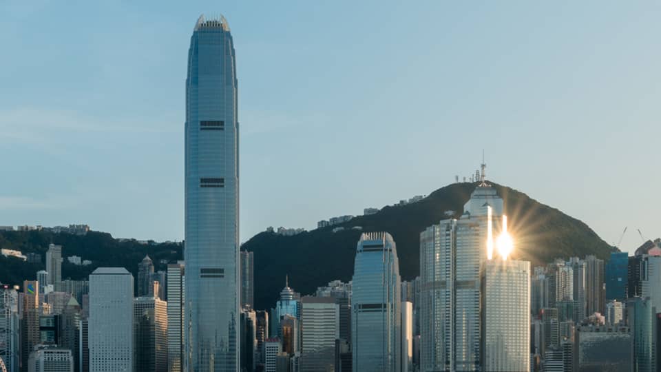 Boats on harbour and Hong Kong city in the background