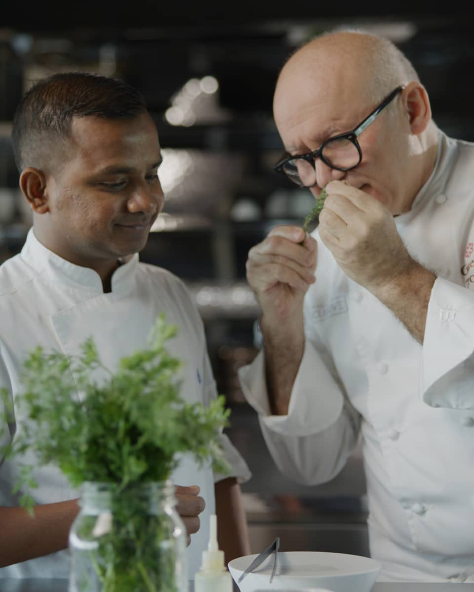 Chef Gaetano Trovato and his apprentice in the kitchen at Blu Beach Club