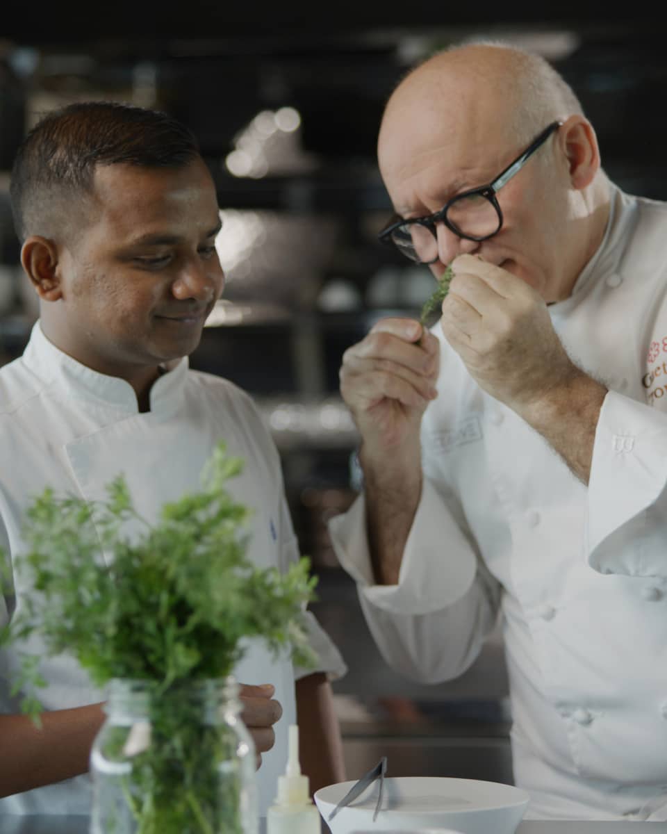 Chef Gaetano Trovato and his apprentice in the kitchen at Blu Beach Club