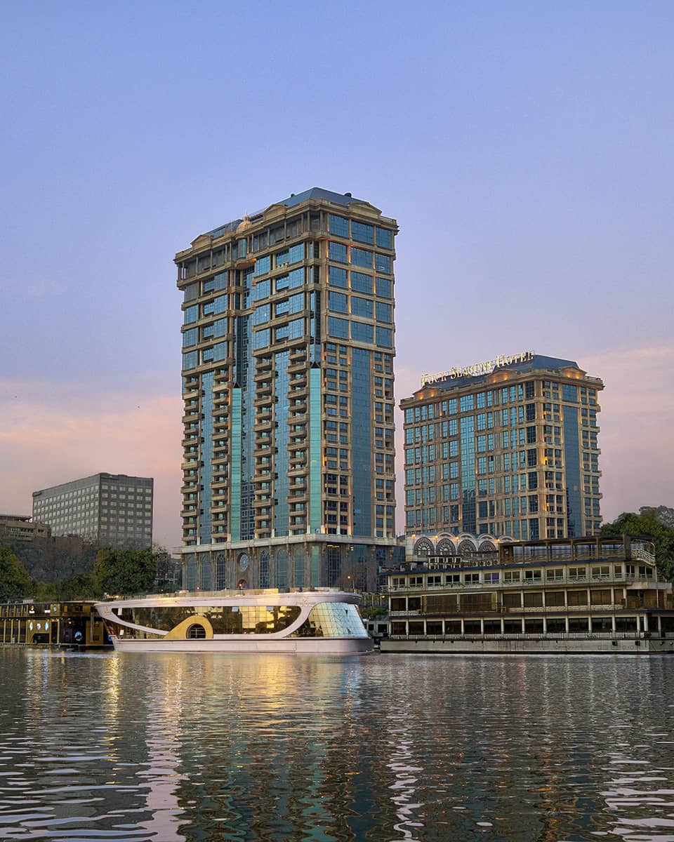 Cairo at the First Residence exterior illuminated at sunset