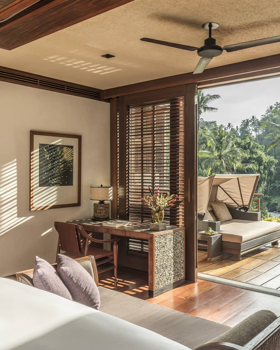 A scenic view from a spacious room overlooking a forest and river in Bali