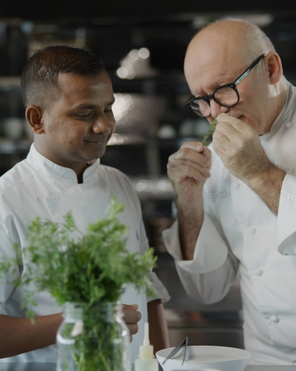 Chef Gaetano Trovato and his apprentice in the kitchen at Blu Beach Club